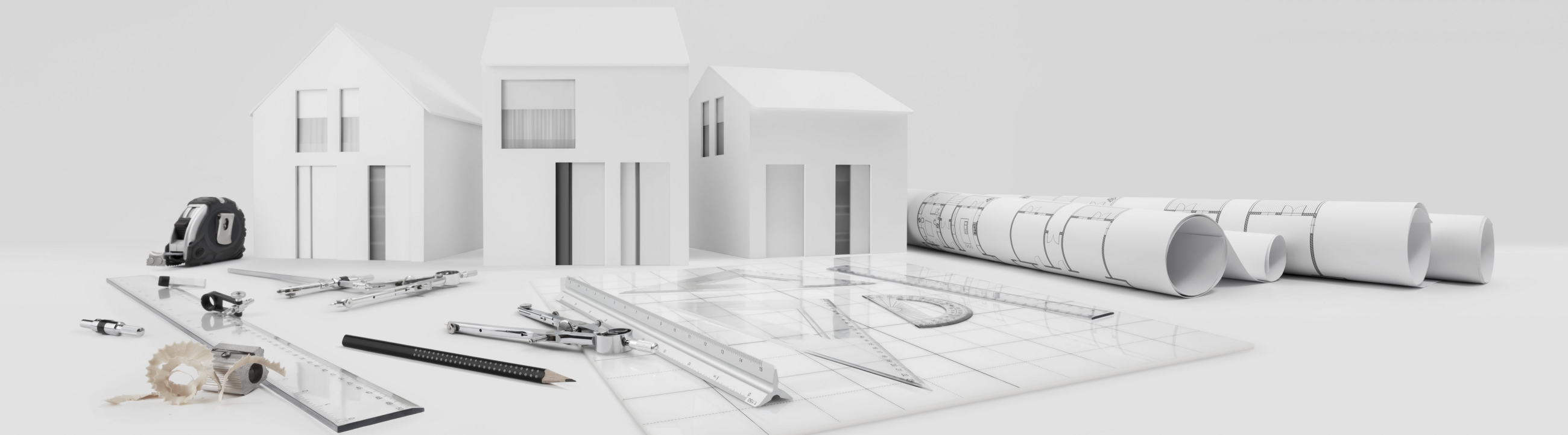 Instruments de mesure devant des maisons en carton